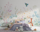 Delicate watercolor wall mural with soft pastel wildflowers, a cute little orange fox, and a small blue bird flying on a textured paper background